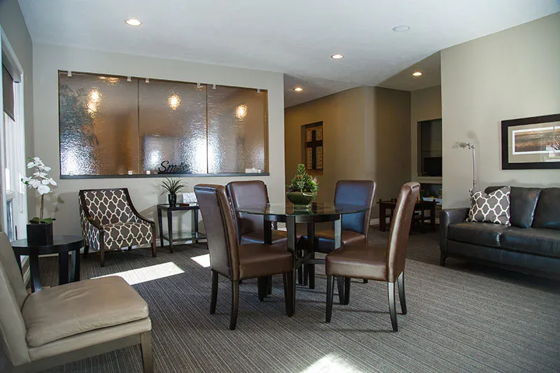 The reception and waiting area, with a glass wall and the word Smile